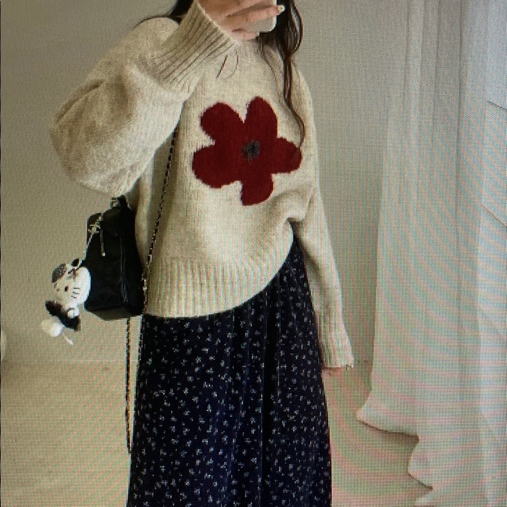 Cozy Cream Sweater with Red Floral Design